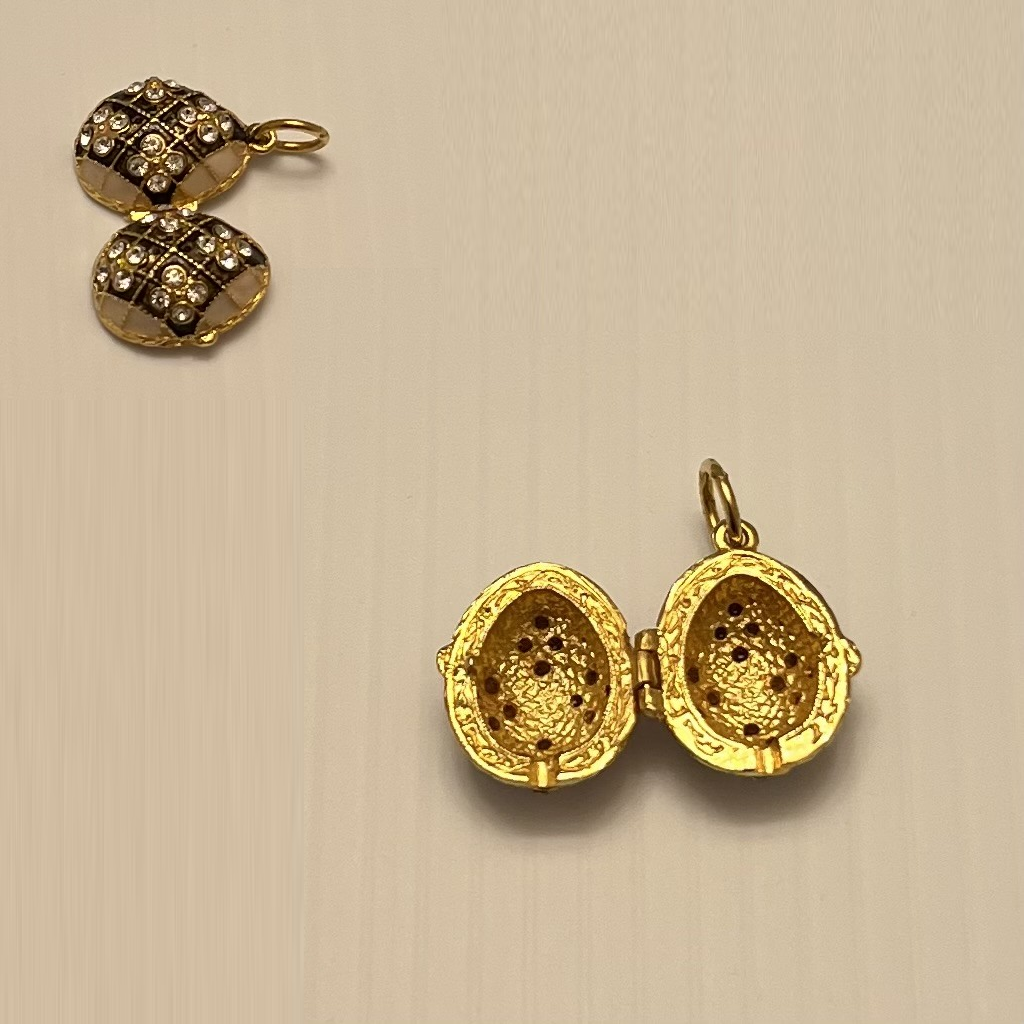 Gold Toned Swarosvki Crystal Egg Pendant Necklace
