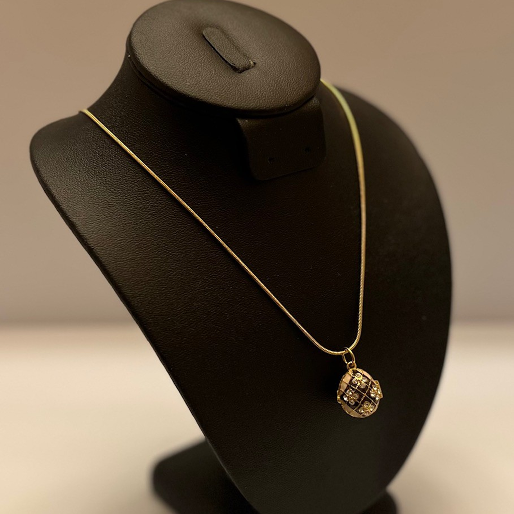 Gold Toned Swarosvki Crystal Egg Pendant Necklace