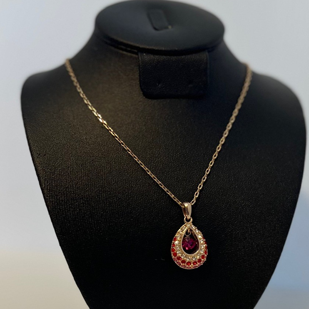 Elegant Gold and Reddish-Pink Teardrop Pendant Necklace