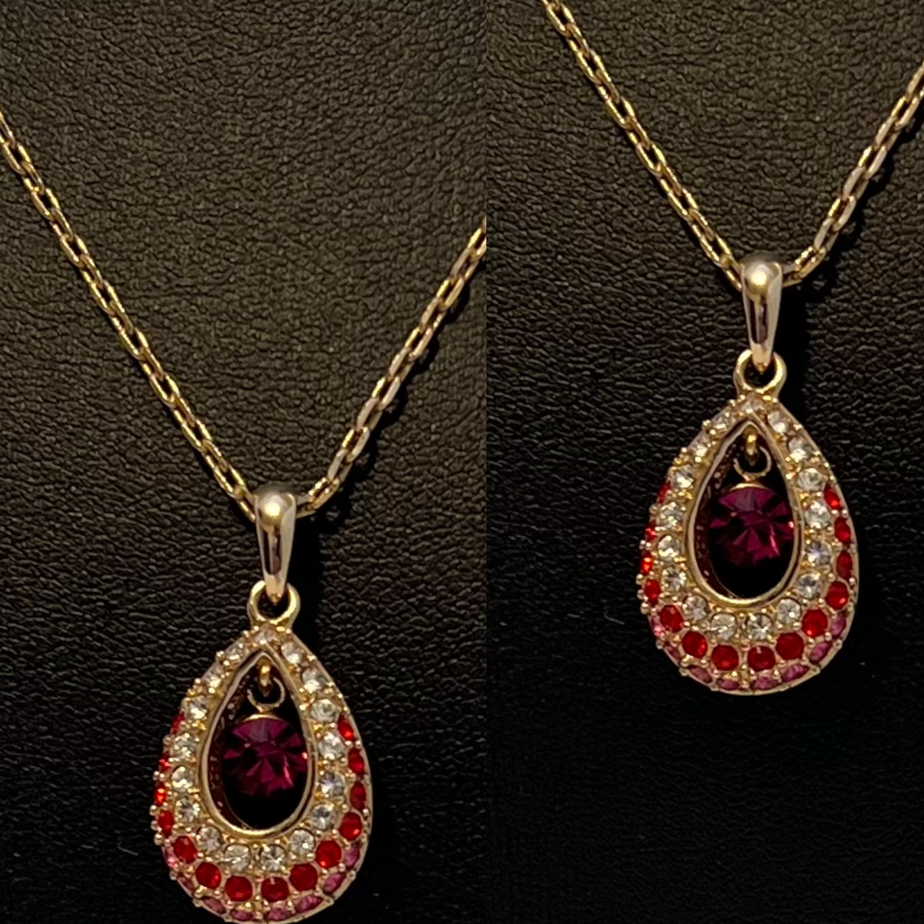 Elegant Gold and Reddish-Pink Teardrop Pendant Necklace
