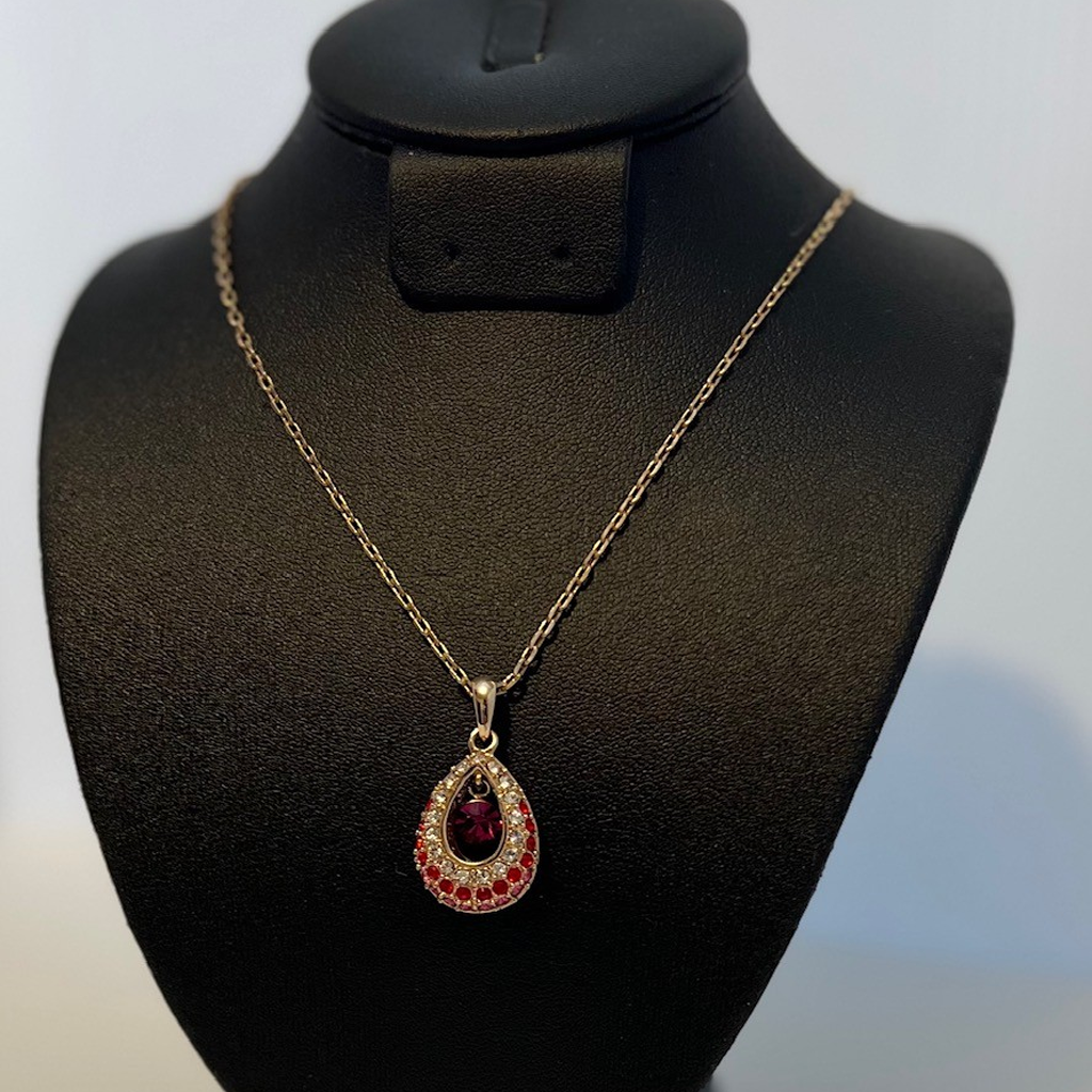 Elegant Gold and Reddish-Pink Teardrop Pendant Necklace
