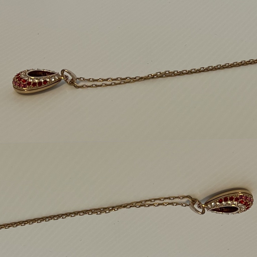Elegant Gold and Reddish-Pink Teardrop Pendant Necklace